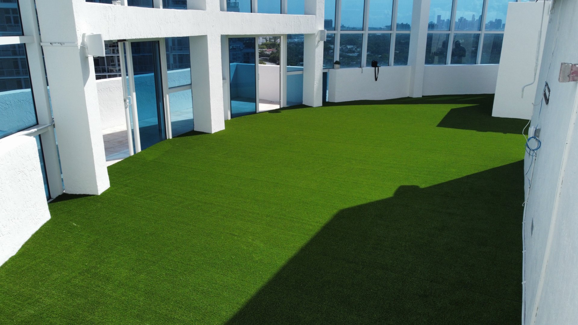 Balcony rooftop artificial grass installation