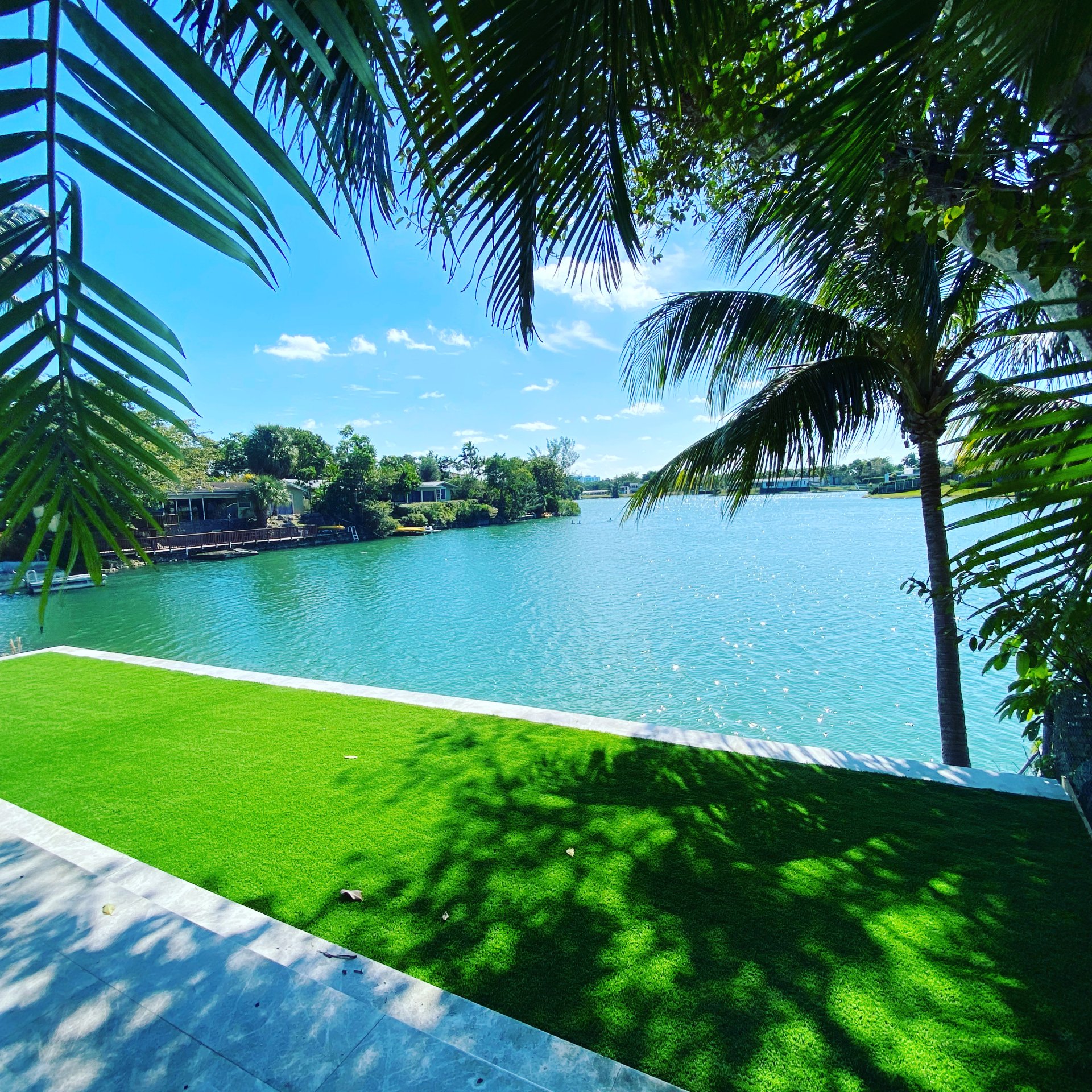 lake front synthetic turf installation south florida home synthetic turf installation